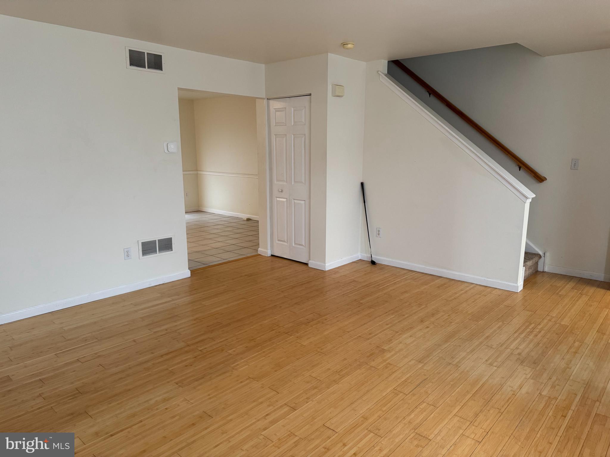 546 Barley Court Smyrna, DE 19977 - Photo 11 of 19 a view of empty room with wooden floor and fan