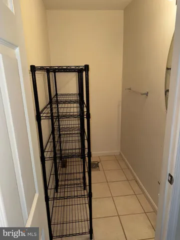 a view of wooden floor in a bathroom