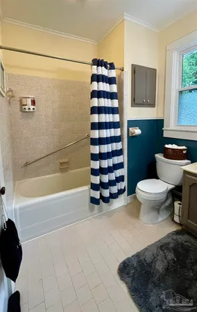 a bathroom with a sink toilet and bathtub
