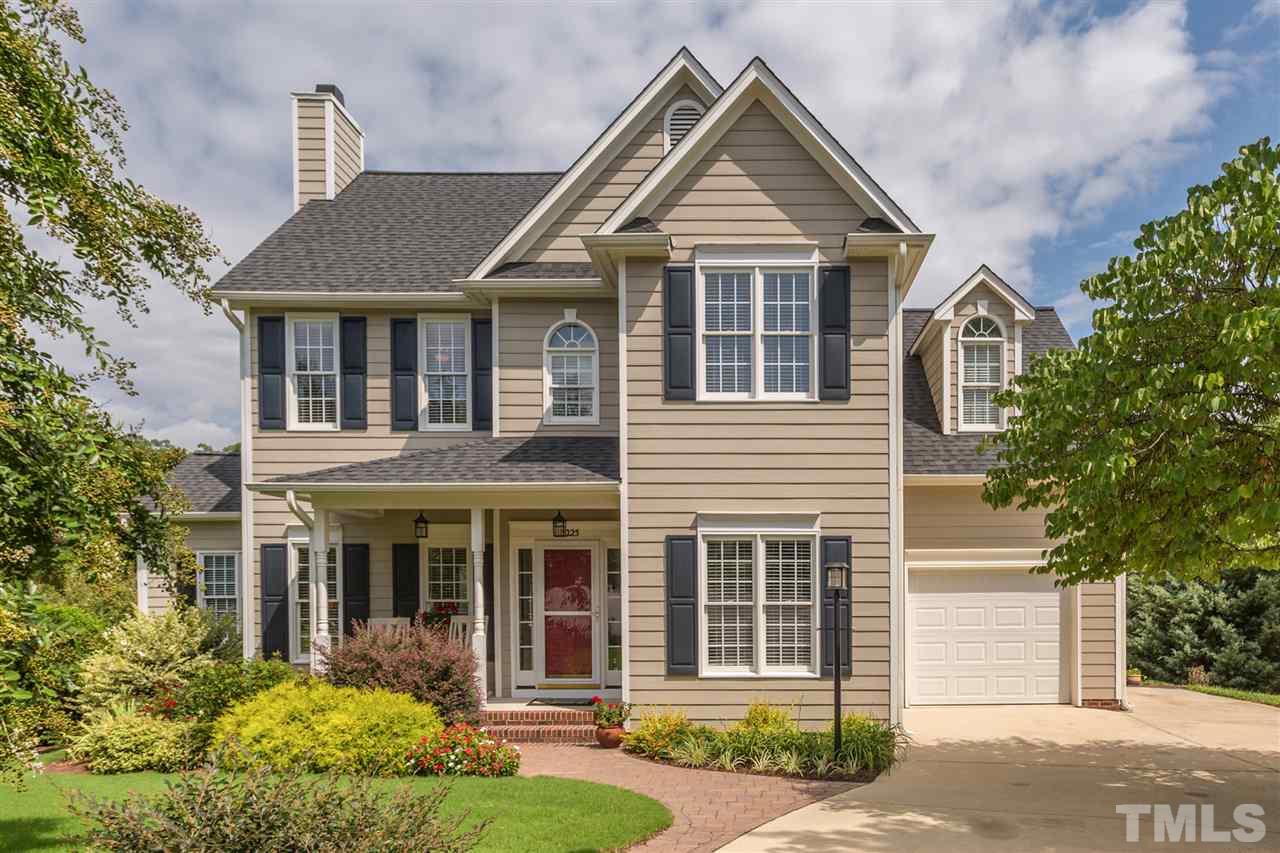 3225 Sandy Bluff Road Raleigh, NC 27616 - Photo 1 of 25 a front view of a house with garden