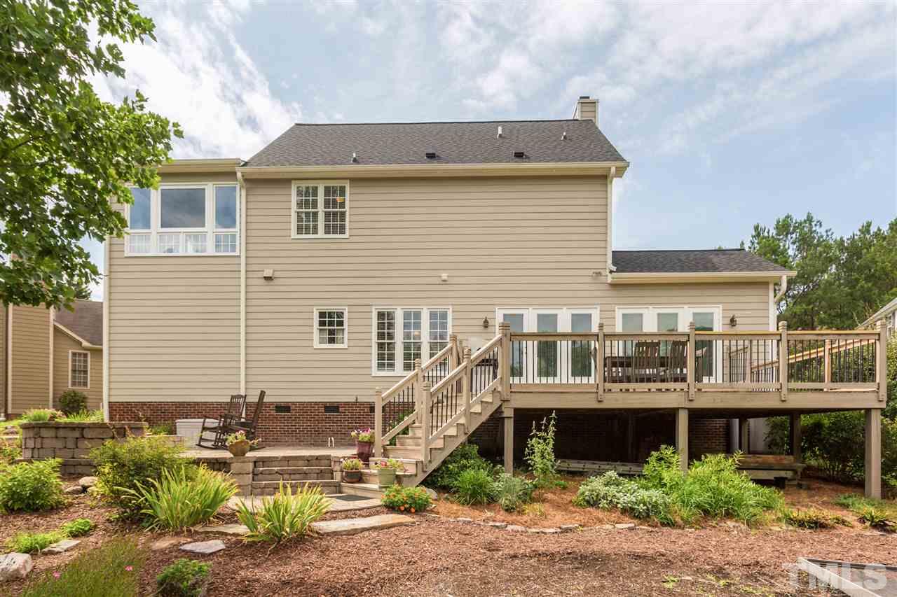 3225 Sandy Bluff Road Raleigh, NC 27616 - Photo 2 of 25 a view of a house with a yard