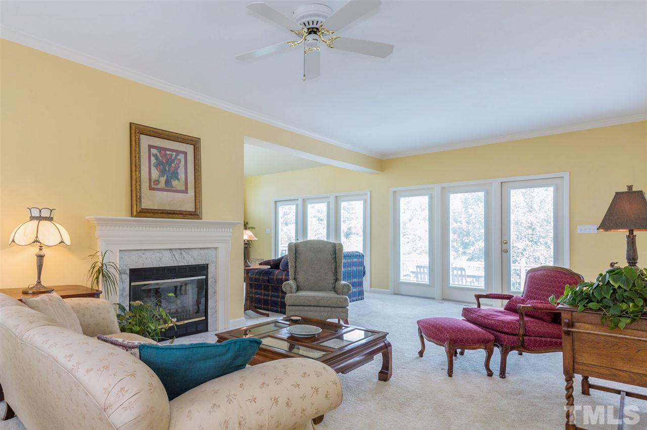3225 Sandy Bluff Road Raleigh, NC 27616 - Photo 11 of 25 a living room with furniture fireplace and window