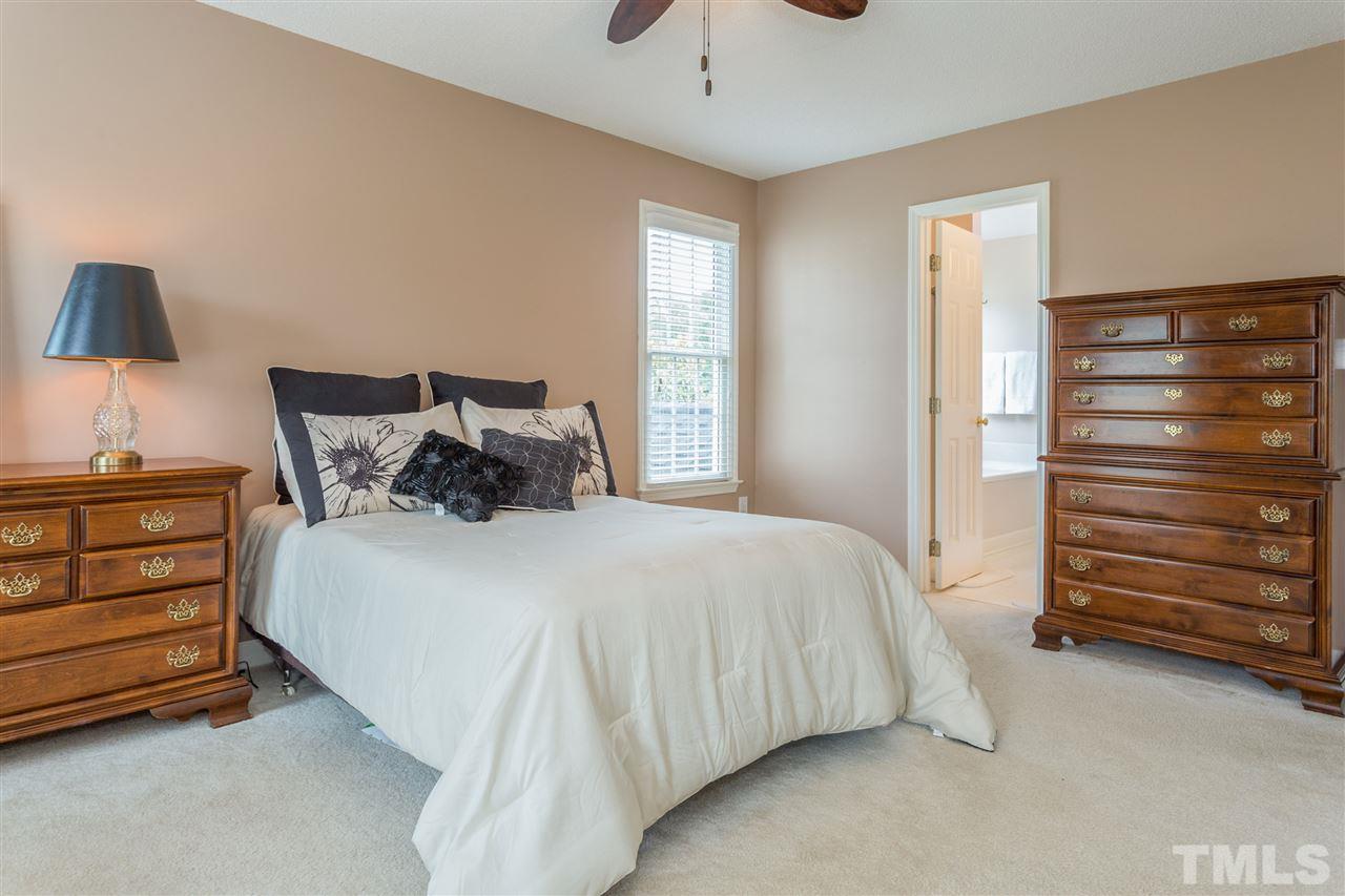 3225 Sandy Bluff Road Raleigh, NC 27616 - Photo 16 of 25 a bedroom with a bed and a closet