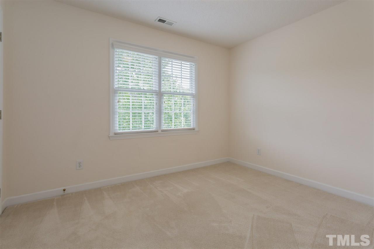 3225 Sandy Bluff Road Raleigh, NC 27616 - Photo 23 of 25 an empty room with a window