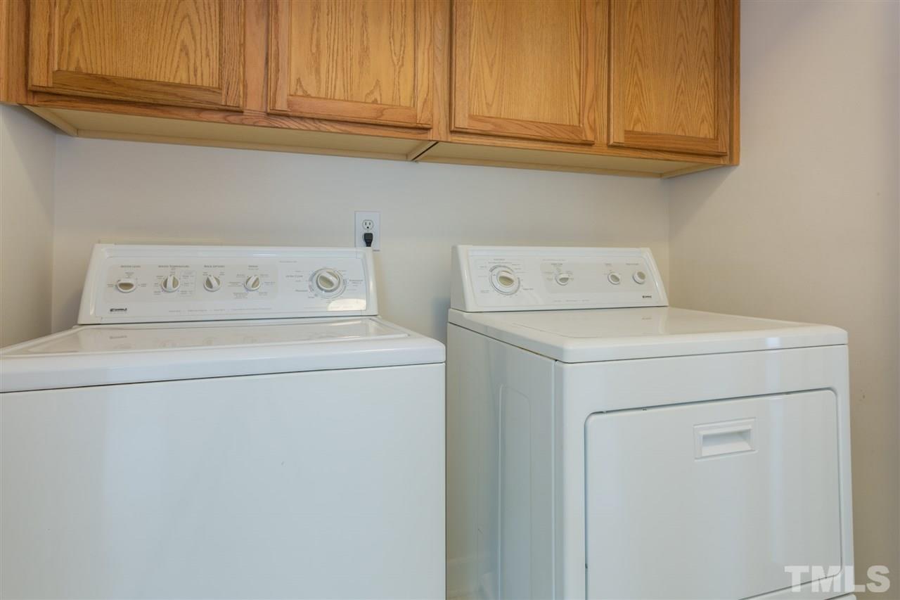3225 Sandy Bluff Road Raleigh, NC 27616 - Photo 24 of 25 a utility room with dryer and washer