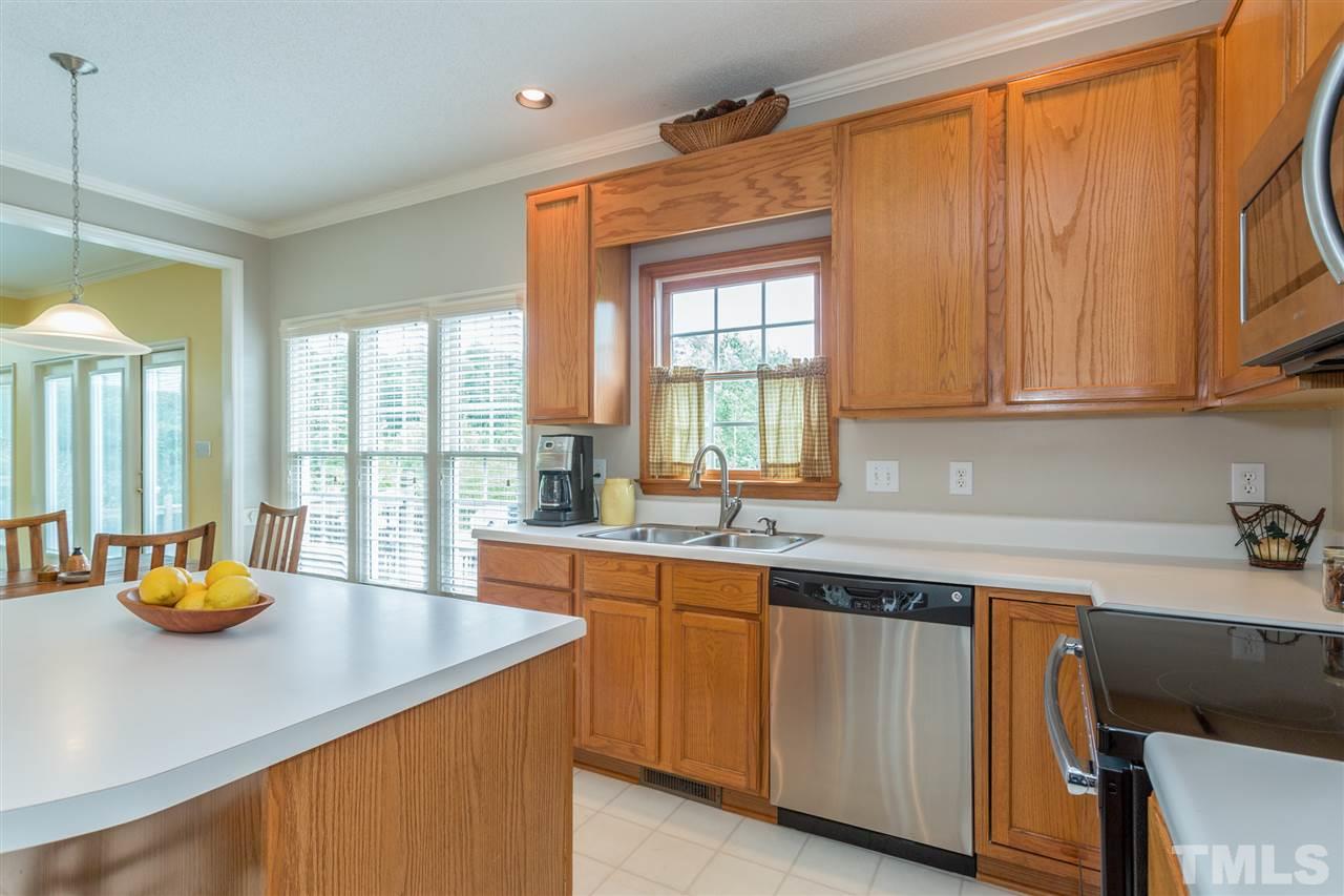 3225 Sandy Bluff Road Raleigh, NC 27616 - Photo 7 of 25 a kitchen with a sink cabinets and window