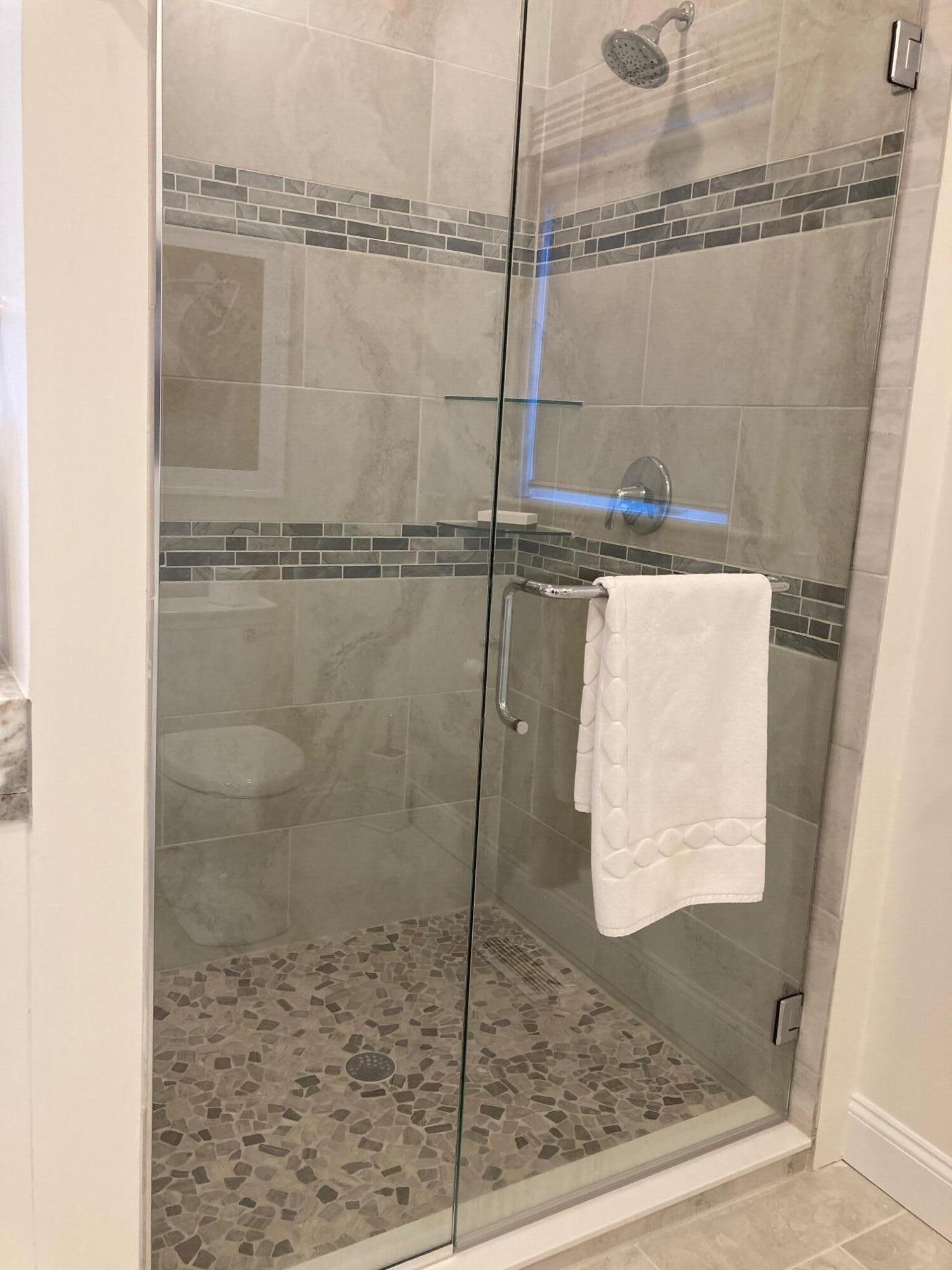 74 Simons Road, Unit B Mashpee, MA 02649 - Photo 5 of 11 a bathroom with a shower