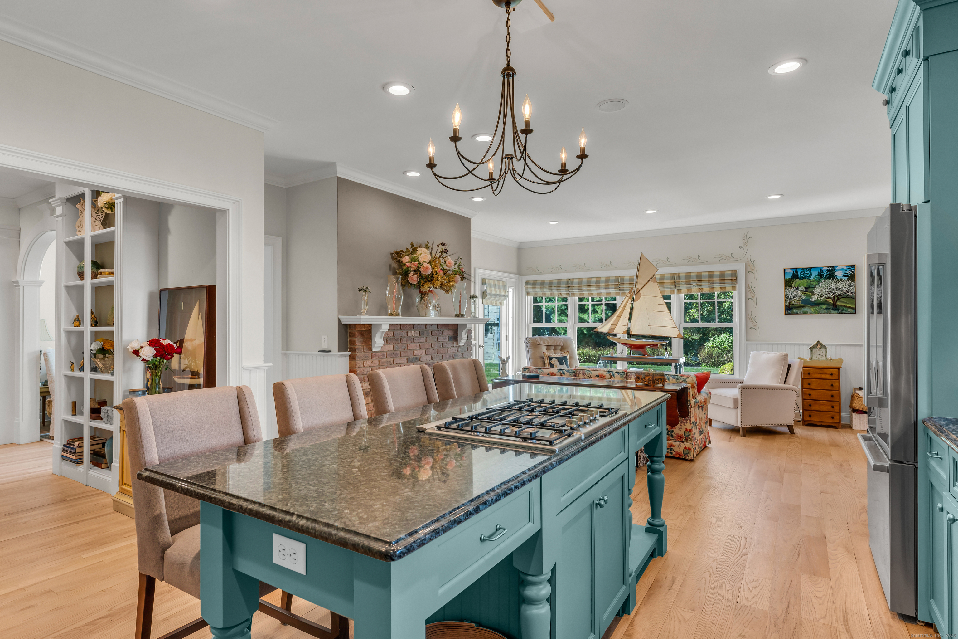 41 Allison Drive Madison, CT 06443 - Photo 13 of 40 a view of a dining room with furniture window and wooden floor