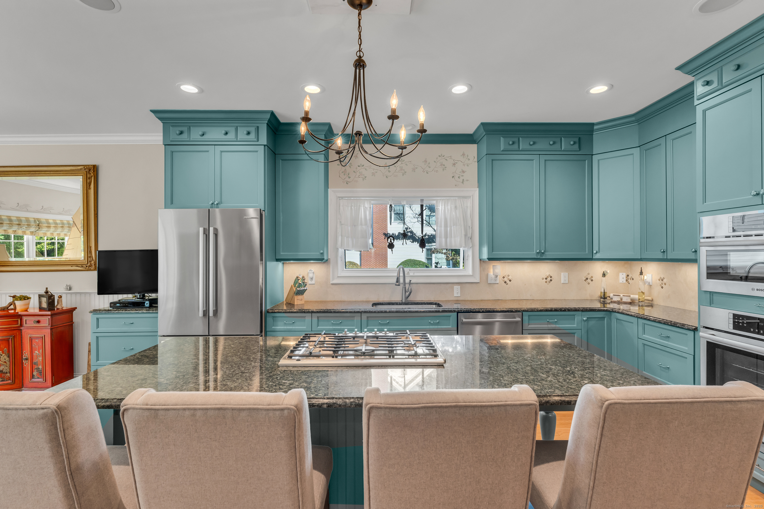 41 Allison Drive Madison, CT 06443 - Photo 15 of 40 a kitchen with stainless steel appliances granite countertop a refrigerator a stove and a sink