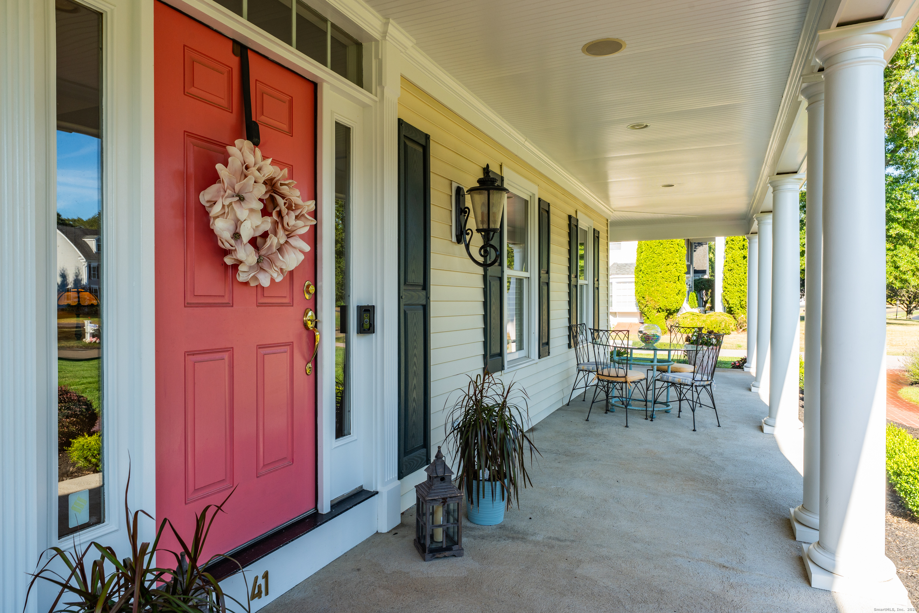 41 Allison Drive Madison, CT 06443 - Photo 2 of 40 a view of a entryway door with dining room and furniture