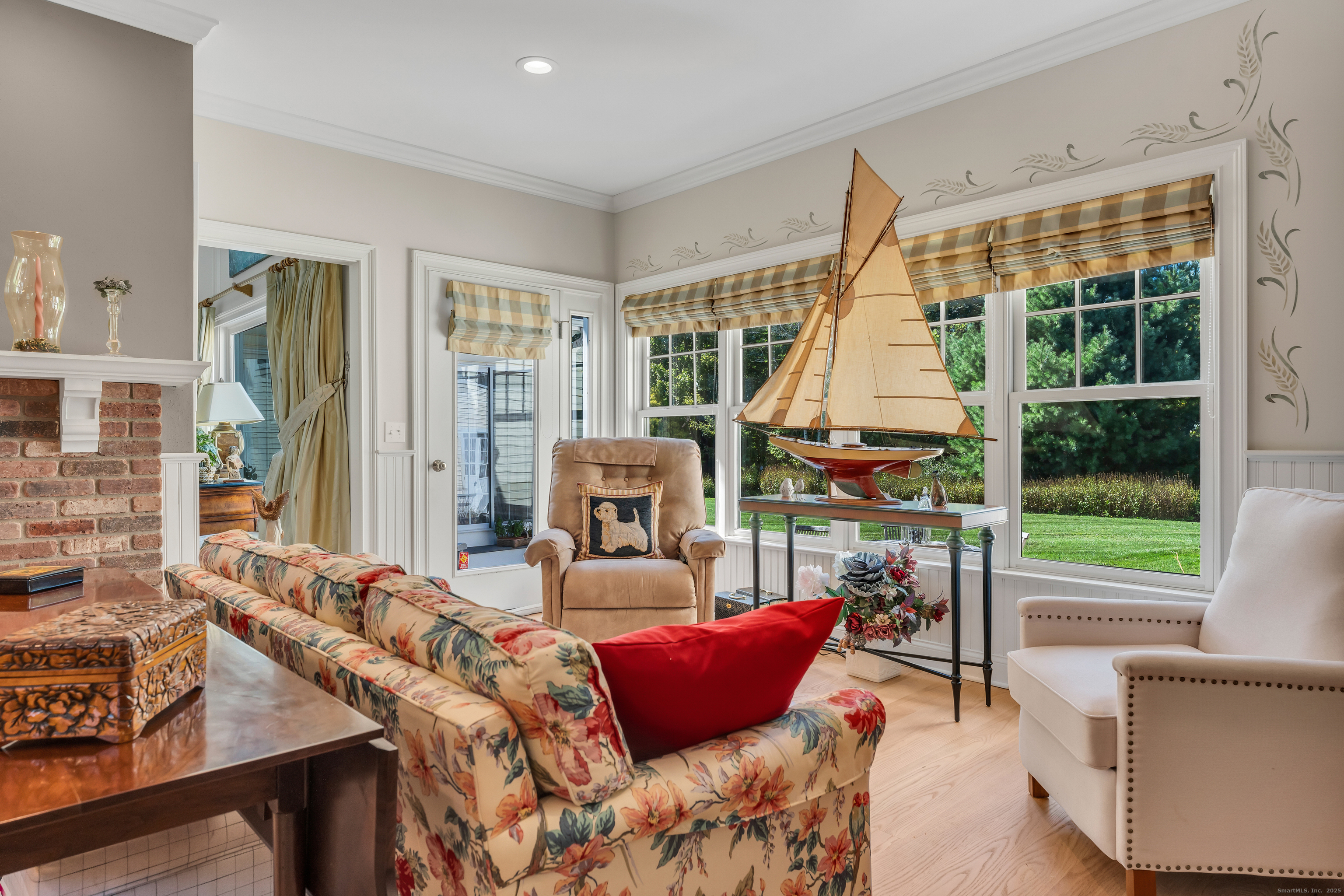 41 Allison Drive Madison, CT 06443 - Photo 21 of 40 a living room with furniture and a large window