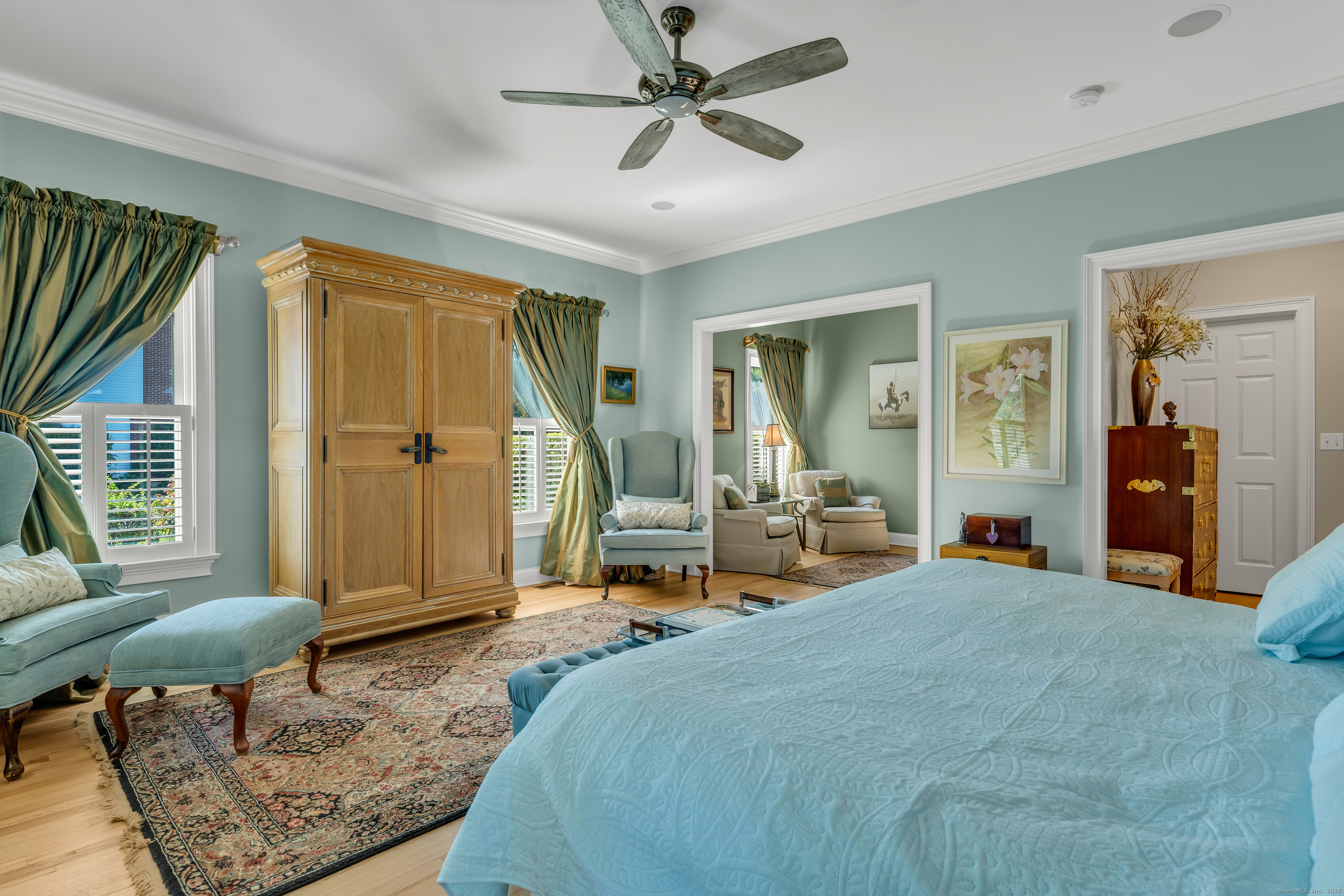 41 Allison Drive Madison, CT 06443 - Photo 25 of 40 a bedroom with a bed a couch and a window