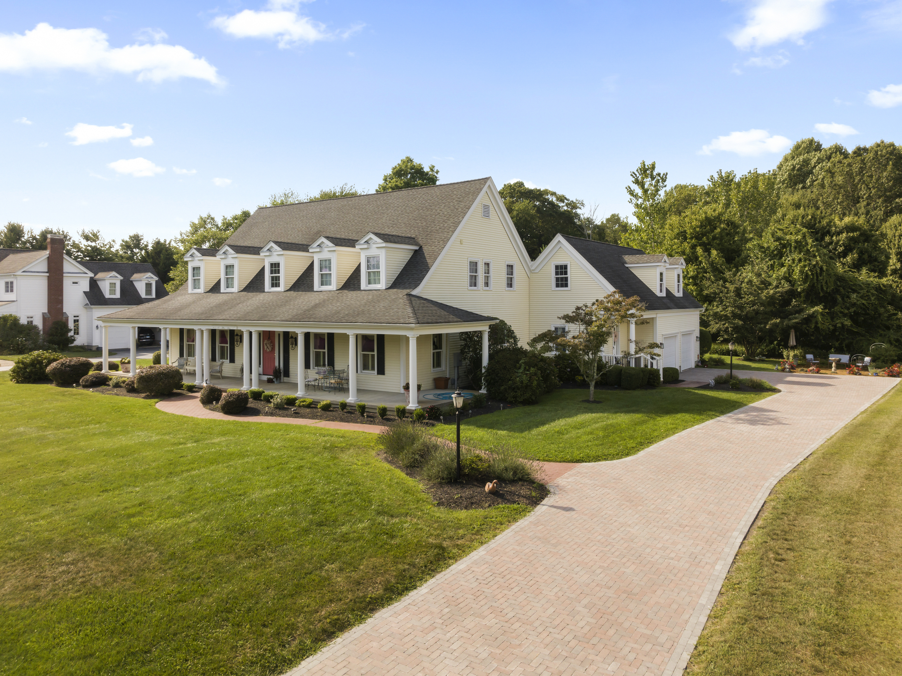 41 Allison Drive Madison, CT 06443 - Photo 3 of 40 a front view of a house with garden