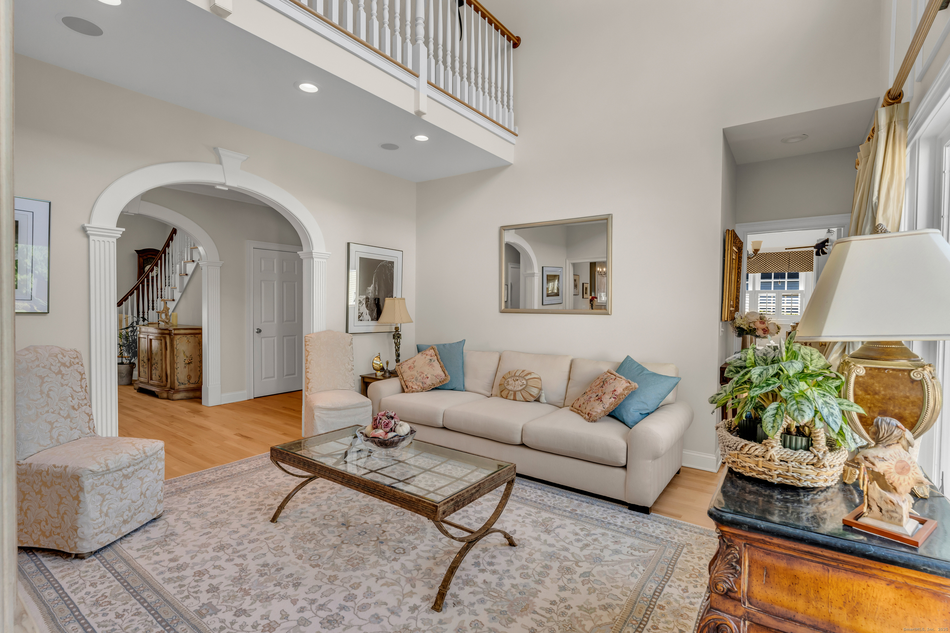 41 Allison Drive Madison, CT 06443 - Photo 8 of 40 a living room with furniture and a potted plant