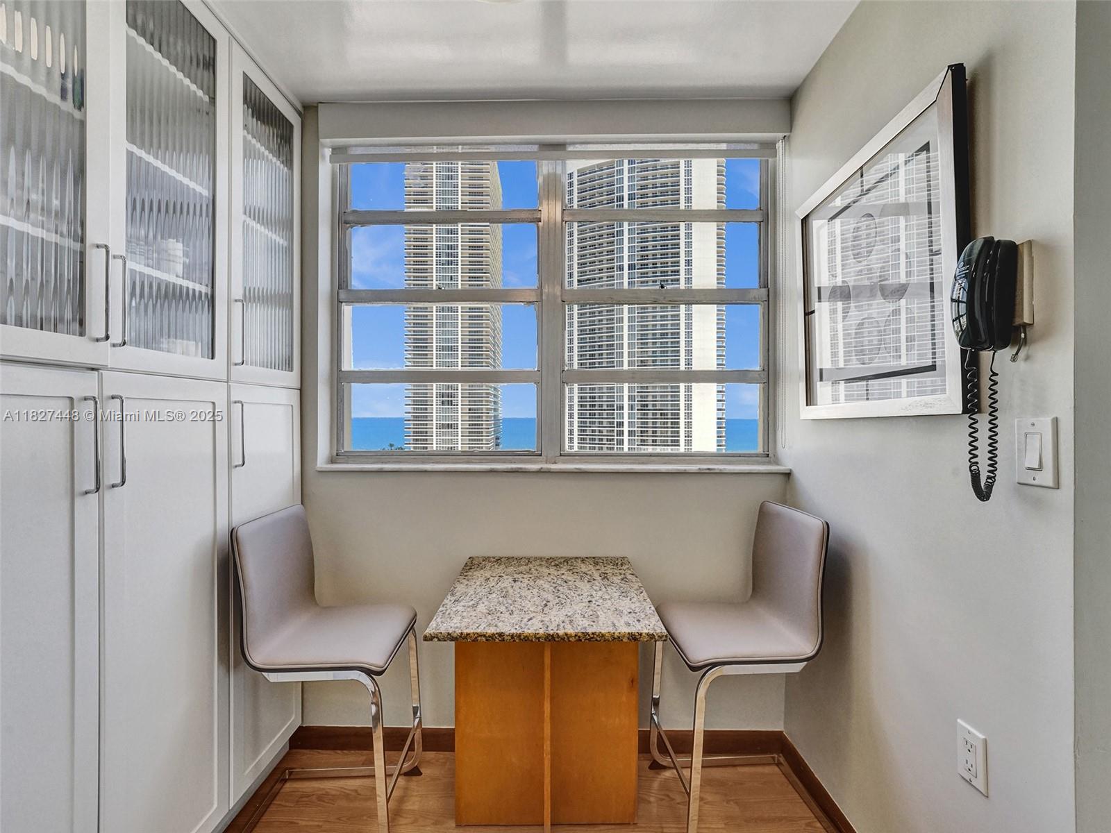 1833 South Ocean Drive, Unit 1702 Hallandale Beach, FL 33009 - Photo 19 of 80 a view of a dining room with furniture and a window