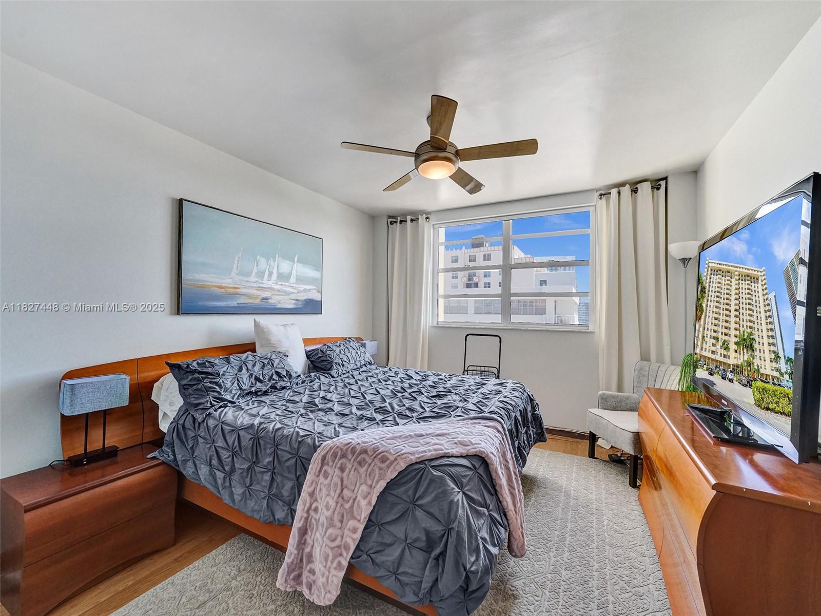 1833 South Ocean Drive, Unit 1702 Hallandale Beach, FL 33009 - Photo 42 of 80 a bedroom with a bed and dresser