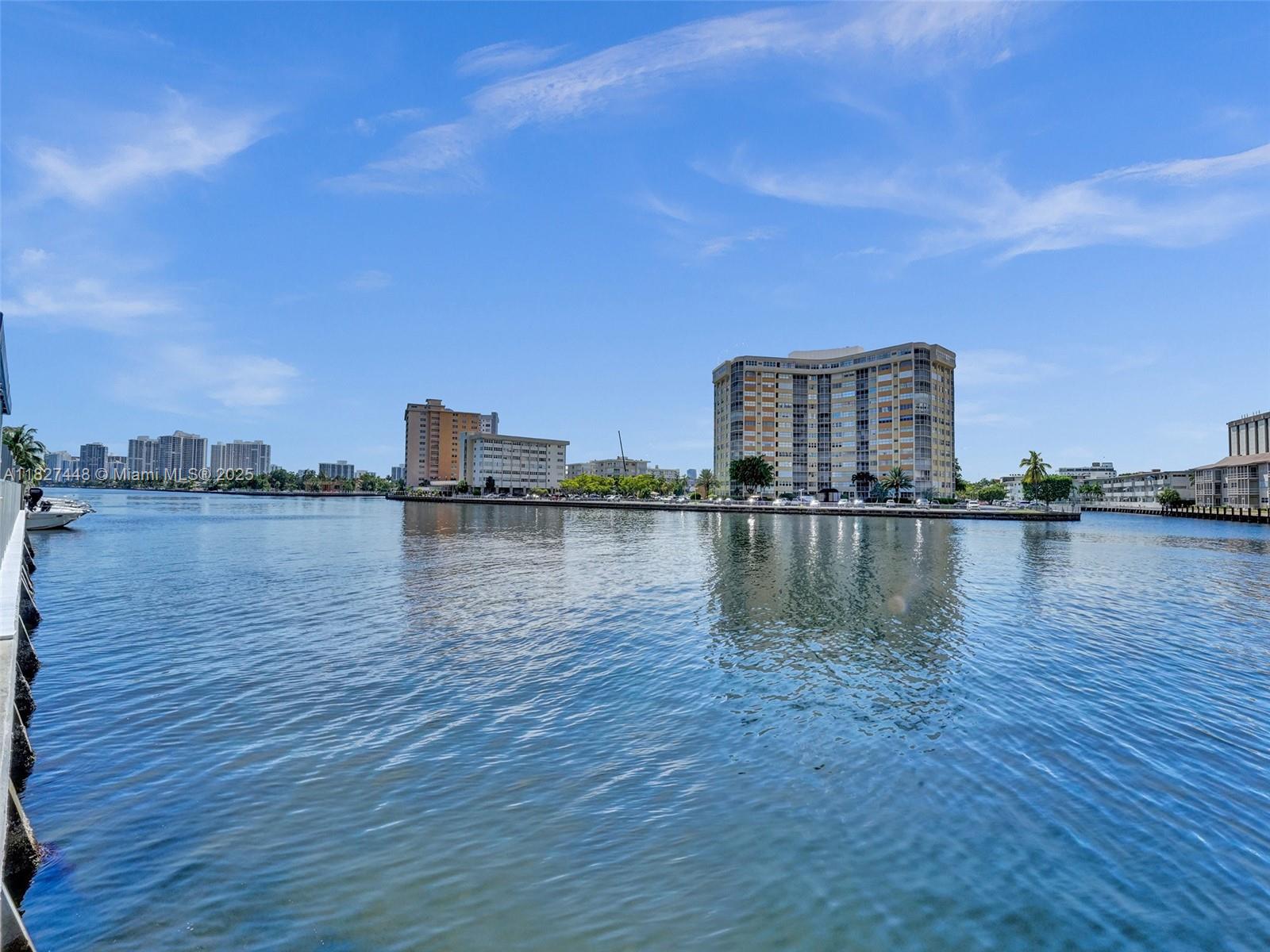 1833 South Ocean Drive, Unit 1702 Hallandale Beach, FL 33009 - Photo 63 of 80 a view of a lake with houses