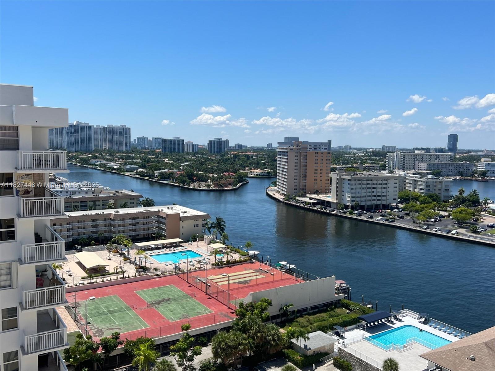 1833 South Ocean Drive, Unit 1702 Hallandale Beach, FL 33009 - Photo 71 of 80 a view of a lake with a city