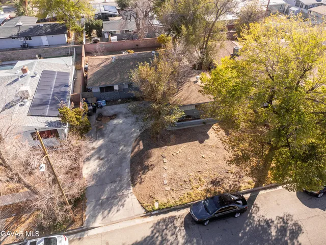 a view of a backyard of a house