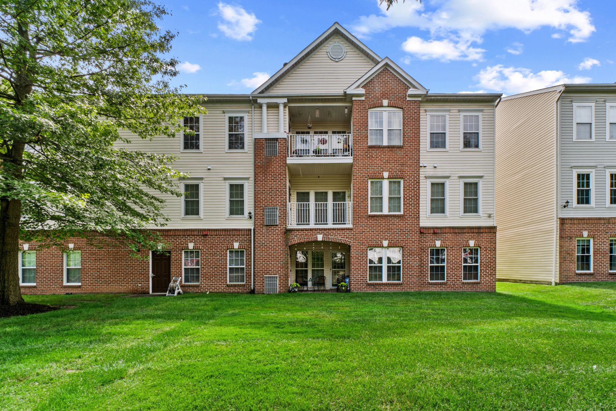 5144 Brightleaf Court, Unit 5144 Rosedale, MD 21237 - Photo 33 of 35 Charming brick condo with greenery.