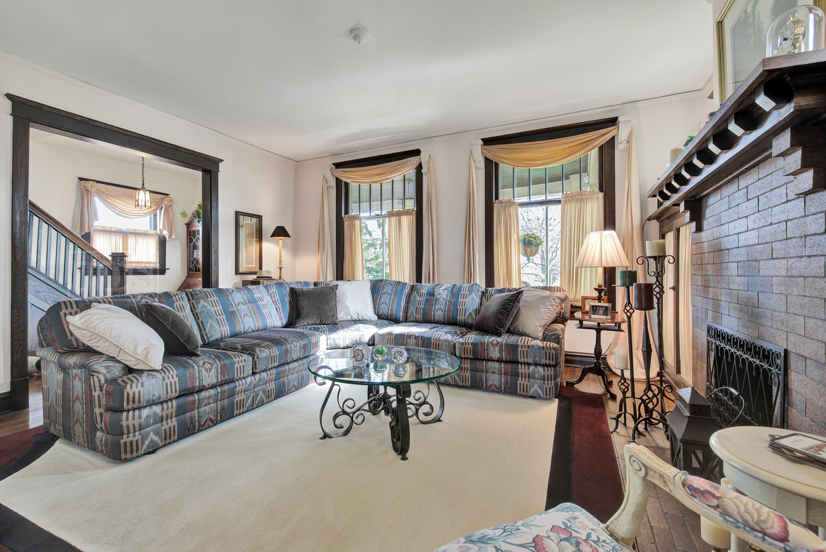 4512 Wolf Road Western Springs, IL 60558 - Photo 11 of 40 a living room with furniture and a fireplace
