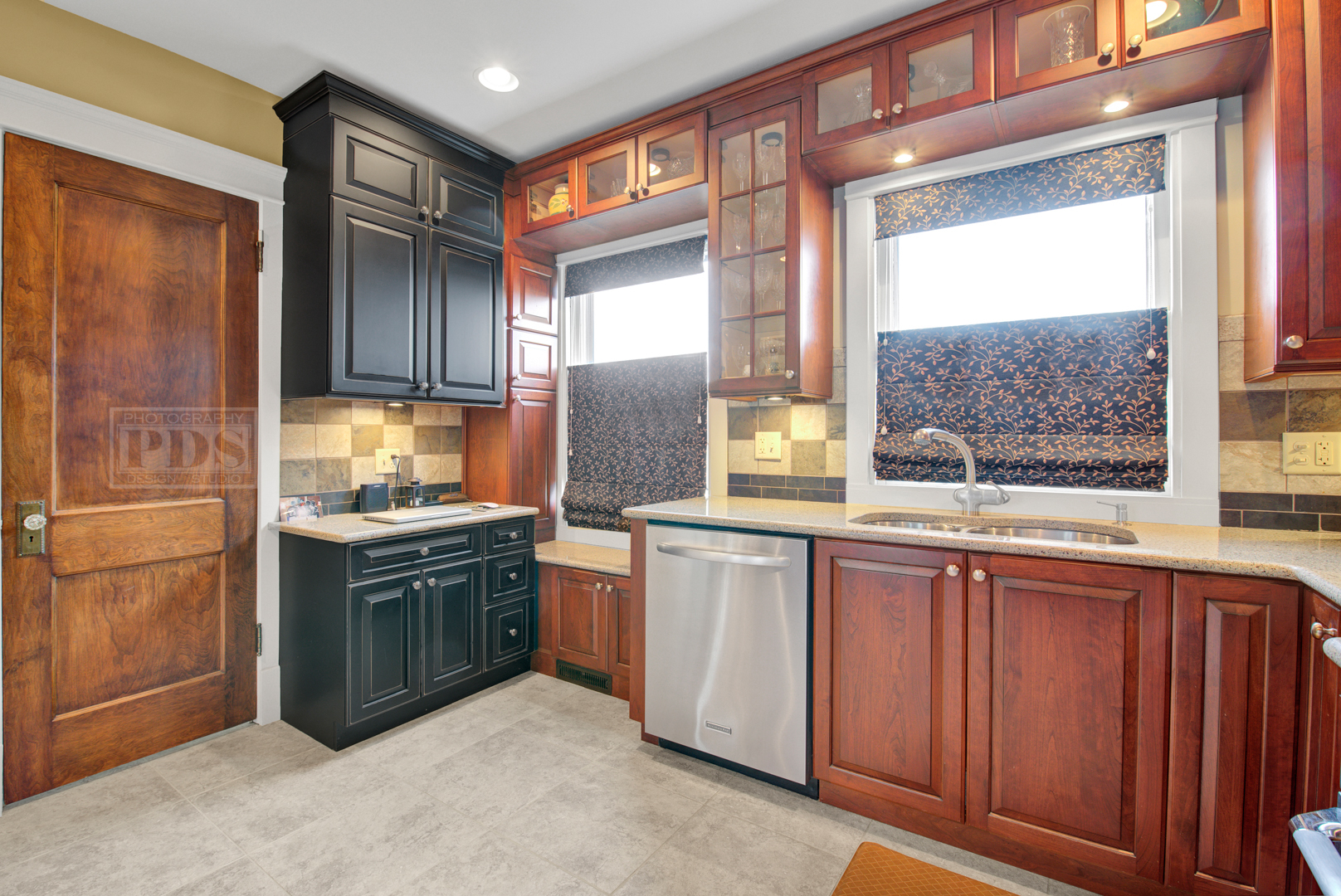 4512 Wolf Road Western Springs, IL 60558 - Photo 20 of 40 a kitchen with stainless steel appliances granite countertop a sink stove and refrigerator