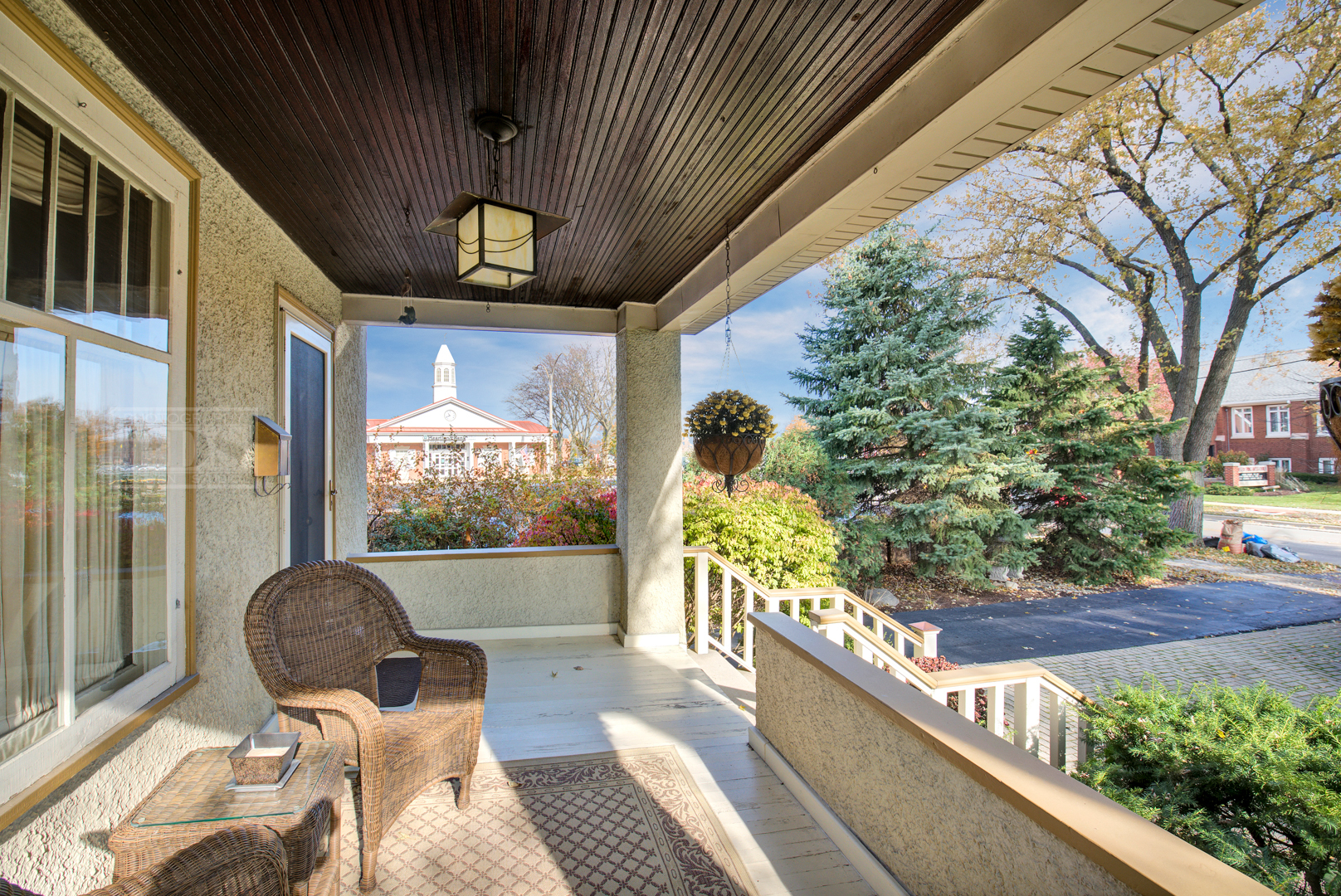 4512 Wolf Road Western Springs, IL 60558 - Photo 5 of 40 a view of a chairs and table in patio with a wooden fence
