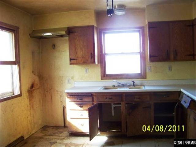 1390 Rice Road Fallon, NV 89406 - Photo 2 of 9 a kitchen with a sink and a window