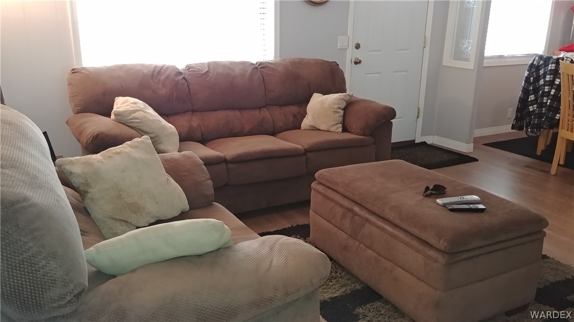4057 Cavalry Road Fort Mohave, AZ 86426 - Photo 4 of 12 a living room with furniture and a couch