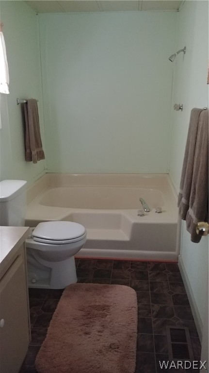 4057 Cavalry Road Fort Mohave, AZ 86426 - Photo 8 of 12 a bathroom with a toilet and a shower
