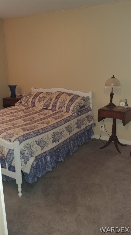 4057 Cavalry Road Fort Mohave, AZ 86426 - Photo 9 of 12 a bedroom with bed and window