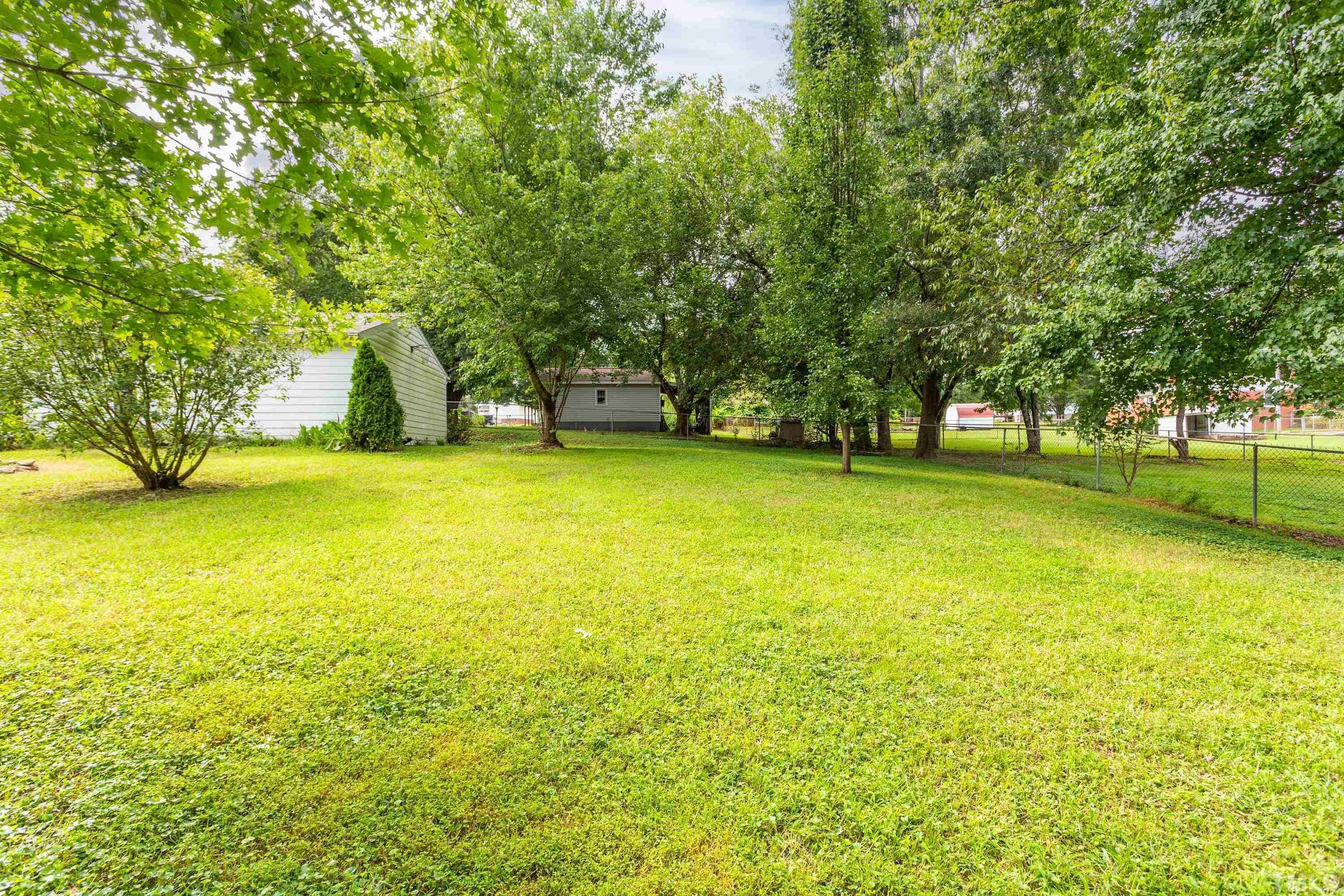 143 Spring Park Road Wake Forest, NC 27587 - Photo 24 of 29 a view of swimming pool with trees