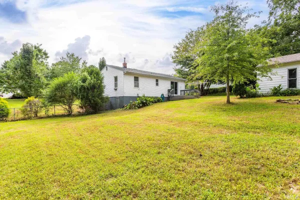 a view of an ocean with a swimming pool