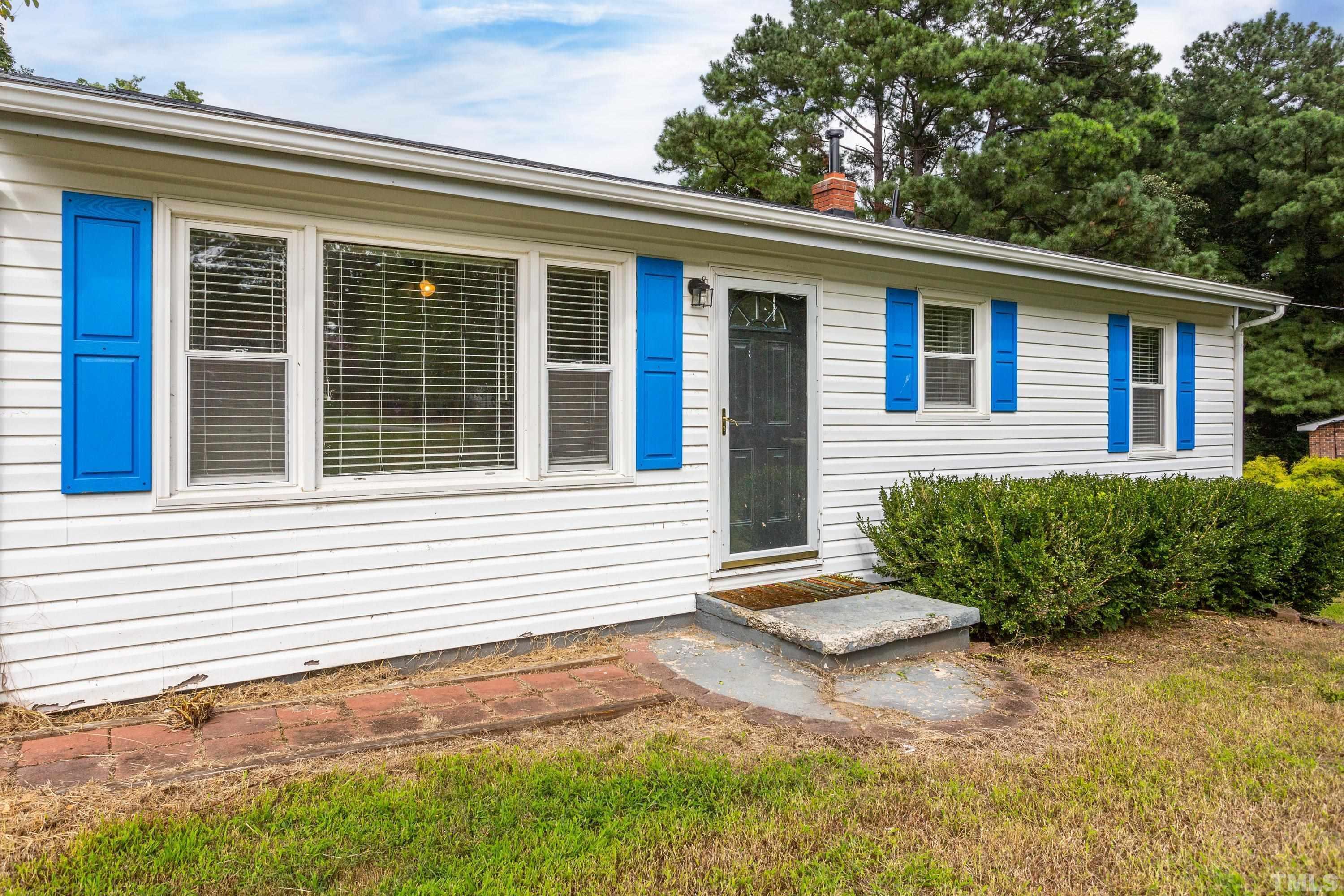 143 Spring Park Road Wake Forest, NC 27587 - Photo 26 of 29 a view of a house with a yard