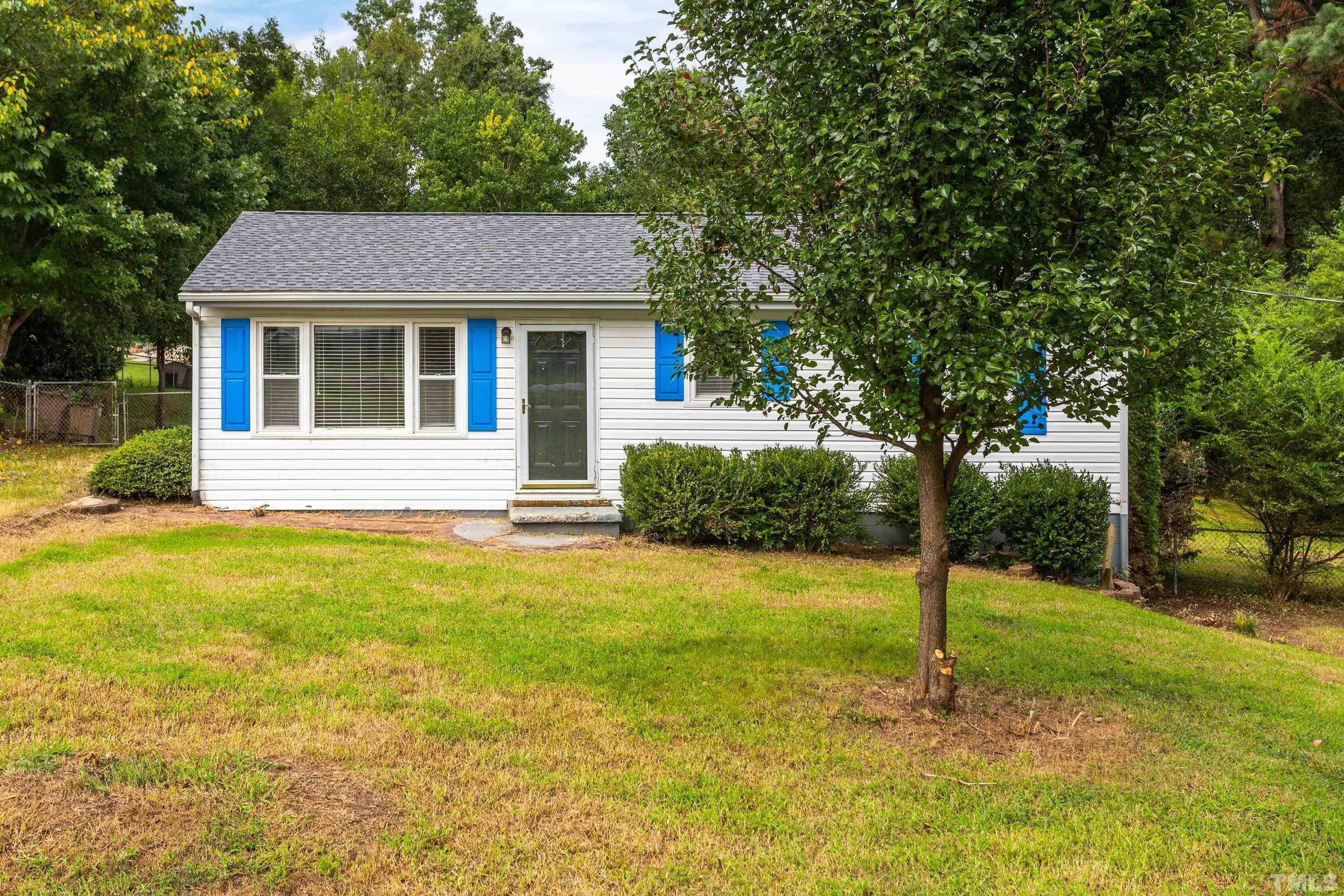 143 Spring Park Road Wake Forest, NC 27587 - Photo 28 of 29 a front view of a house with a yard