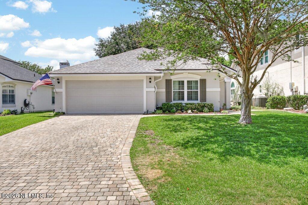 1441 Tintern Lane St. Augustine, FL 32092 - Photo 1 of 57 a front view of house with yard and green space