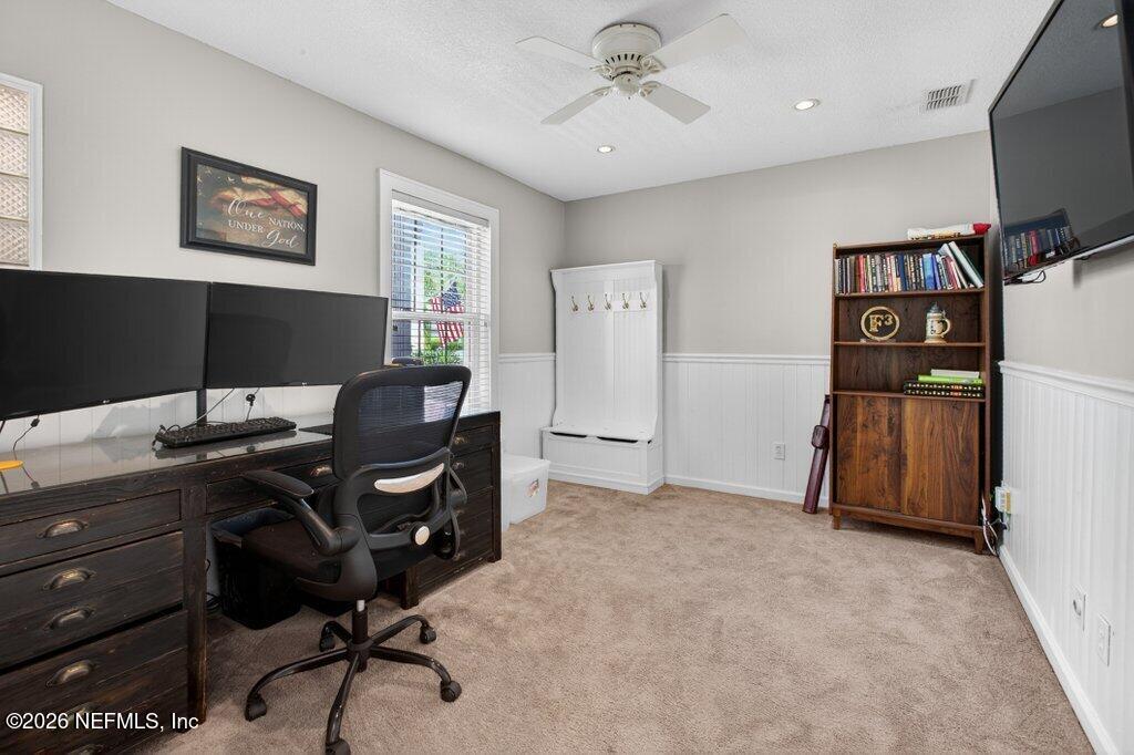 1441 Tintern Lane St. Augustine, FL 32092 - Photo 11 of 57 a view of a workspace with furniture and a window