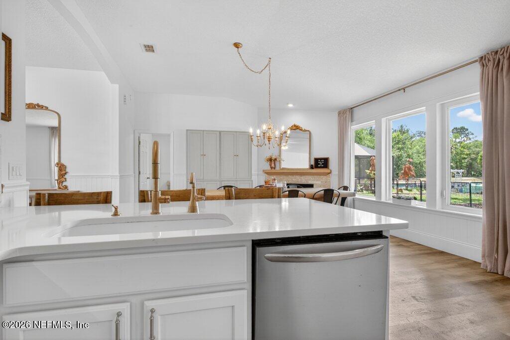 1441 Tintern Lane St. Augustine, FL 32092 - Photo 29 of 57 a kitchen with a sink and a large window