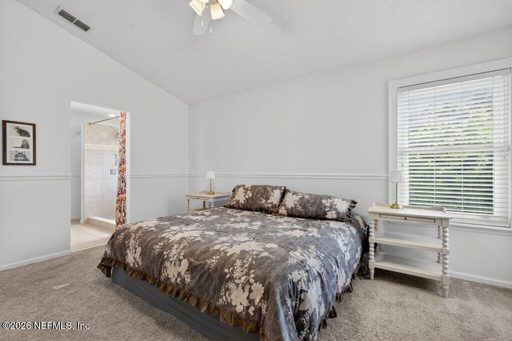 1441 Tintern Lane St. Augustine, FL 32092 - Photo 33 of 57 a bedroom with a bed and a window