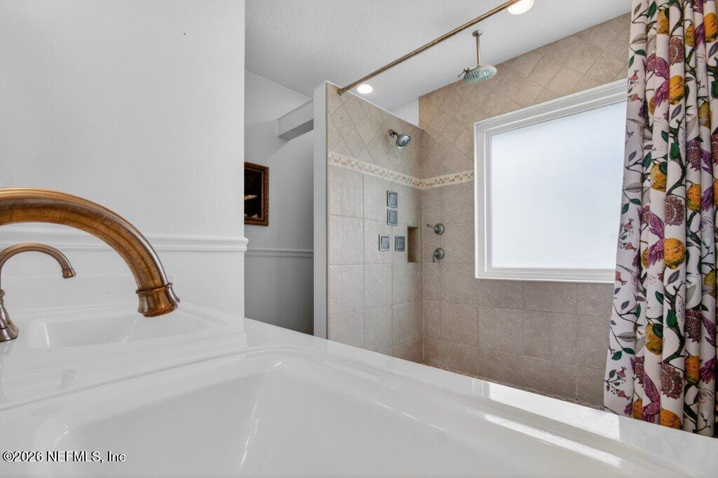 1441 Tintern Lane St. Augustine, FL 32092 - Photo 37 of 57 a bedroom with a bed and a window