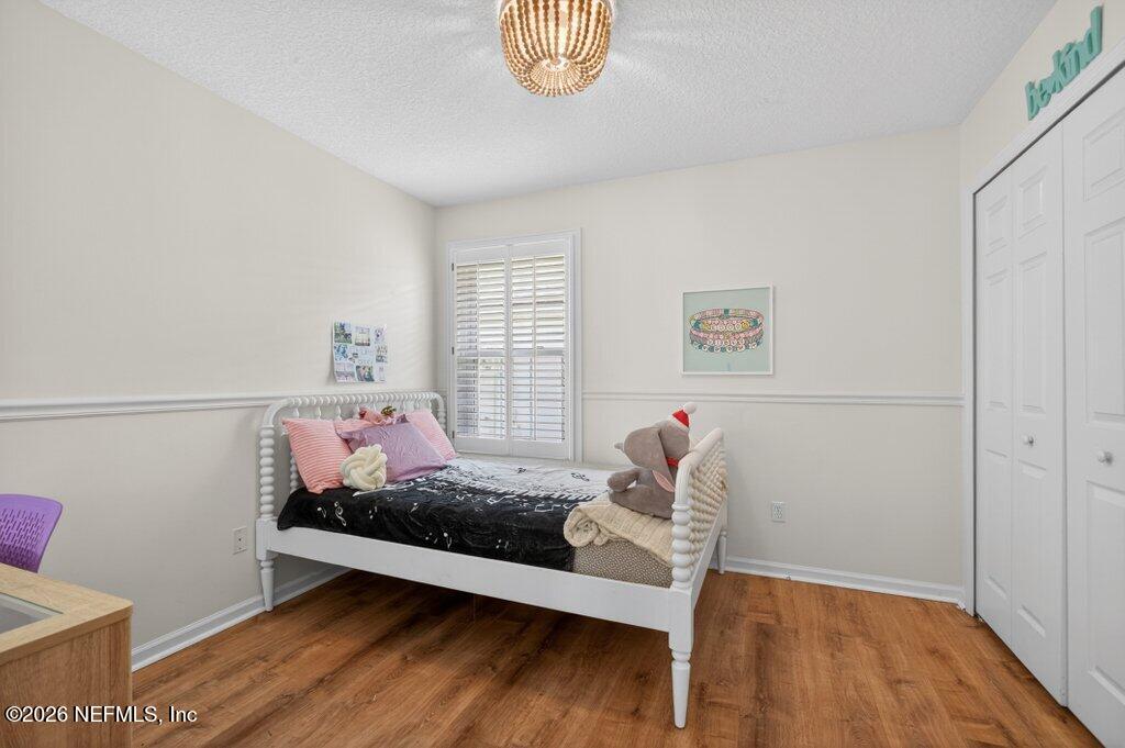 1441 Tintern Lane St. Augustine, FL 32092 - Photo 40 of 57 a bedroom with a bed and a window