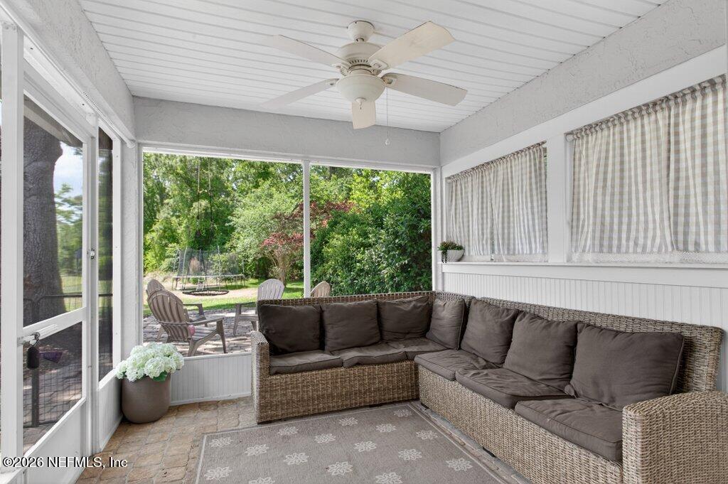 1441 Tintern Lane St. Augustine, FL 32092 - Photo 47 of 57 a living room with furniture and a large window
