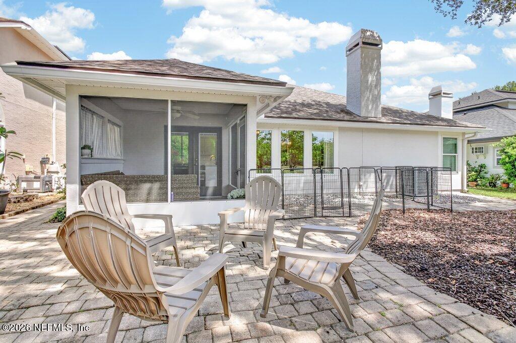 1441 Tintern Lane St. Augustine, FL 32092 - Photo 50 of 57 a view of a patio with table and chairs