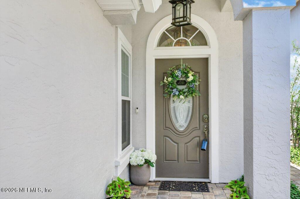 1441 Tintern Lane St. Augustine, FL 32092 - Photo 5 of 57 a front view of a house with garden
