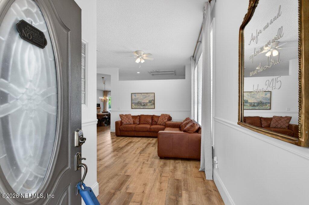 1441 Tintern Lane St. Augustine, FL 32092 - Photo 6 of 57 a living room with furniture and a window