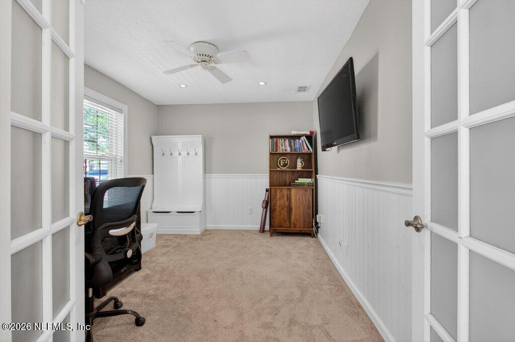 1441 Tintern Lane St. Augustine, FL 32092 - Photo 10 of 57 a view of a workspace with furniture and a window
