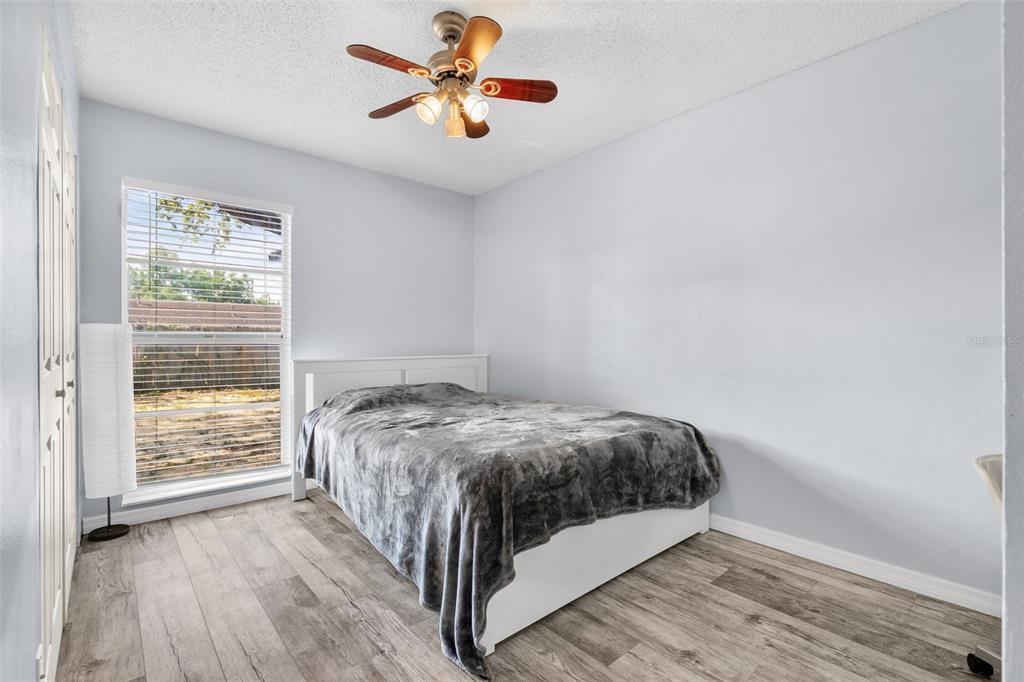 128 Euclid Avenue Seffner, FL 33584 - Photo 15 of 38 a bedroom with a bed and a window