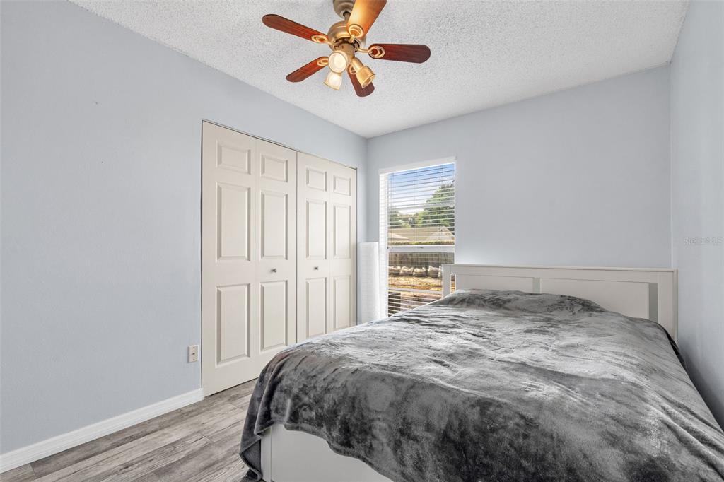 128 Euclid Avenue Seffner, FL 33584 - Photo 16 of 38 a bedroom with a bed and a window