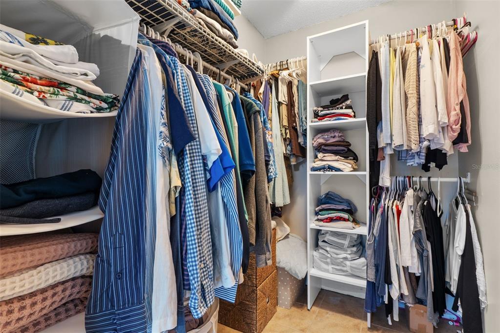 128 Euclid Avenue Seffner, FL 33584 - Photo 26 of 38 a view of walk in closet with clothes and shoes