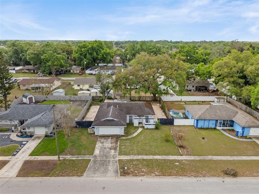 128 Euclid Avenue Seffner, FL 33584 - Photo 33 of 38 an aerial view of a house with a garden